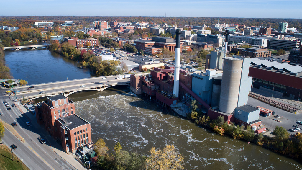 The Power Plant on the Iowa River on a sunny, clear day photographed from the southwest by a drone