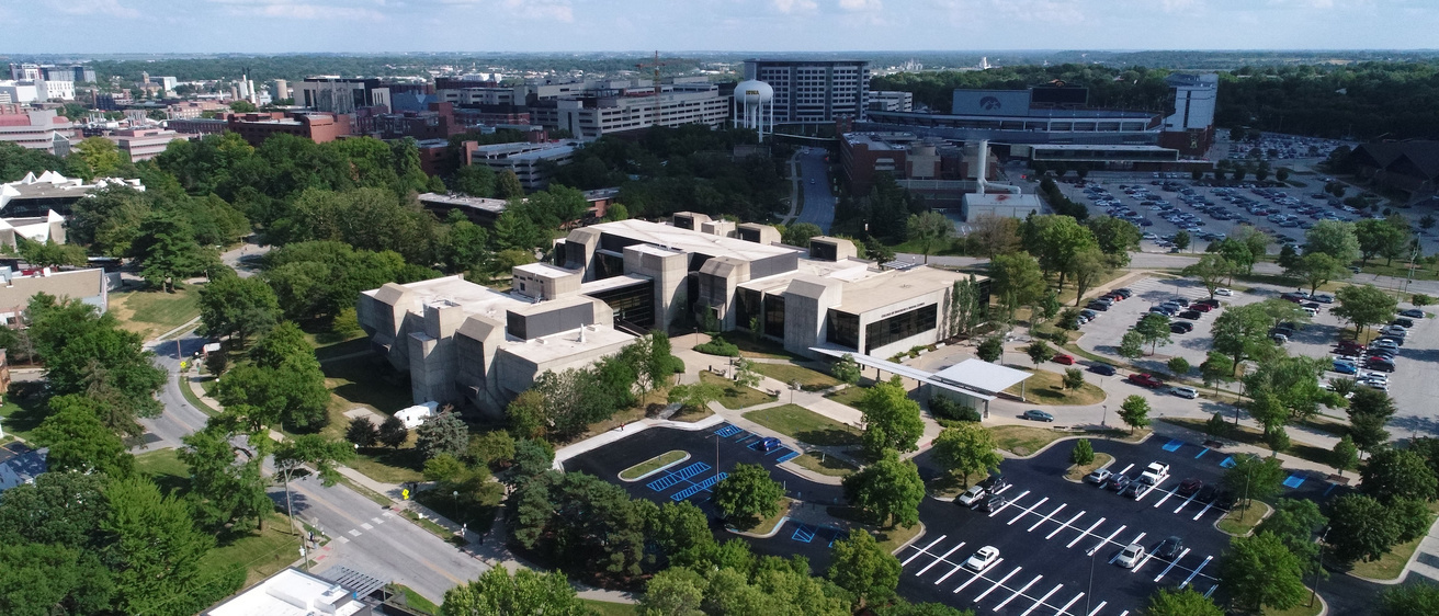 An aerial photo of the Dental Science Building with the UI Hospitals and Clinics in the background